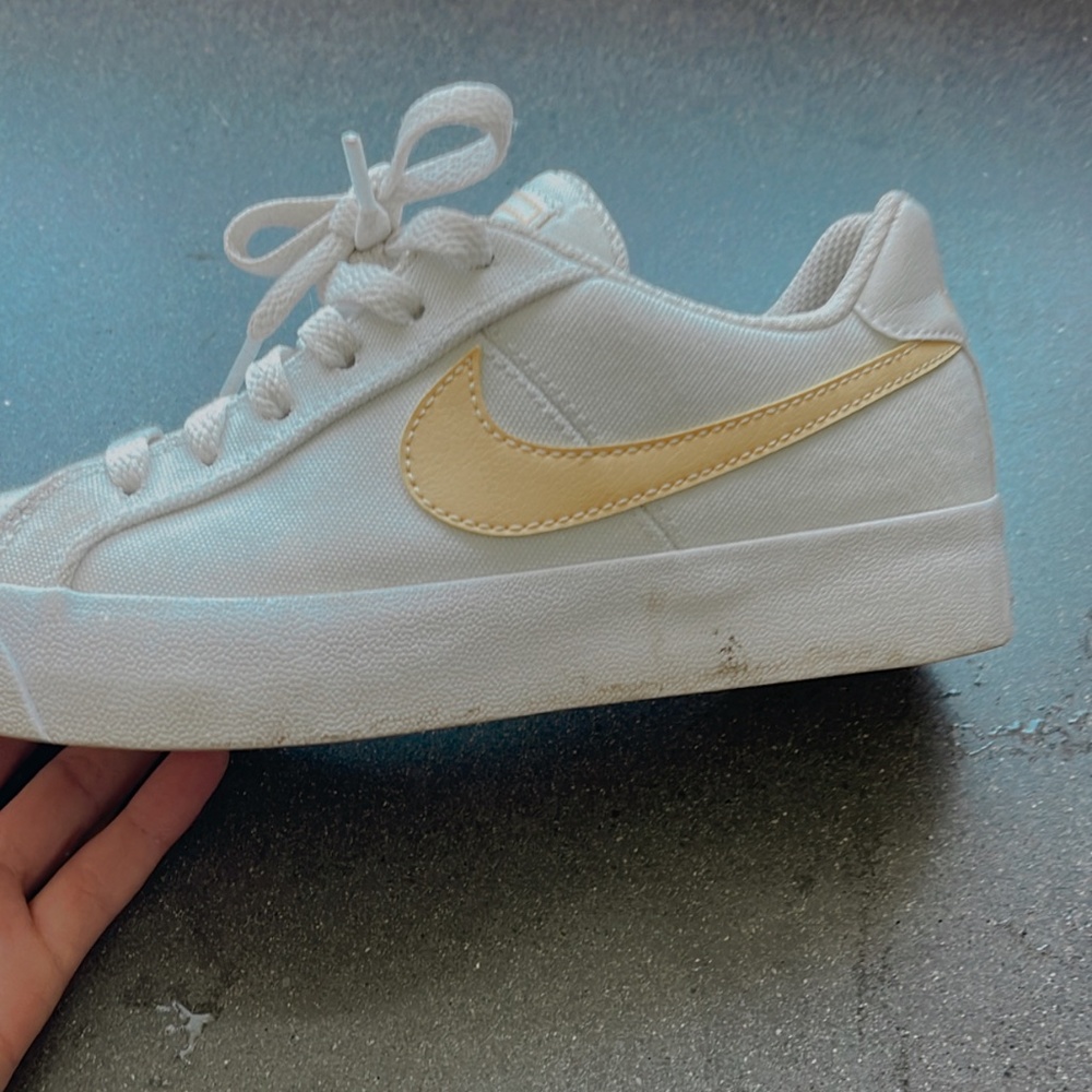 low top nikes yellow size 5 woman's